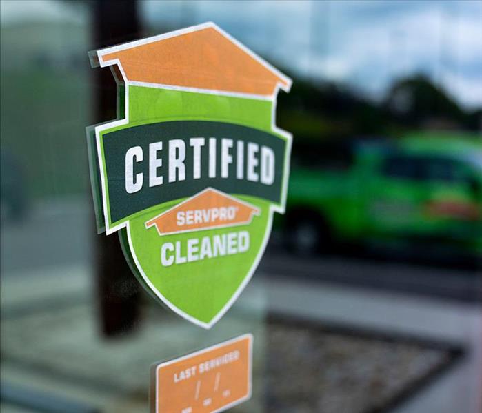 Certified: SERVPRO Cleaned sticker on a business window